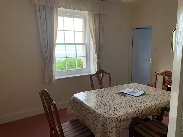 Sealark's separate dining room with a sea glimpse